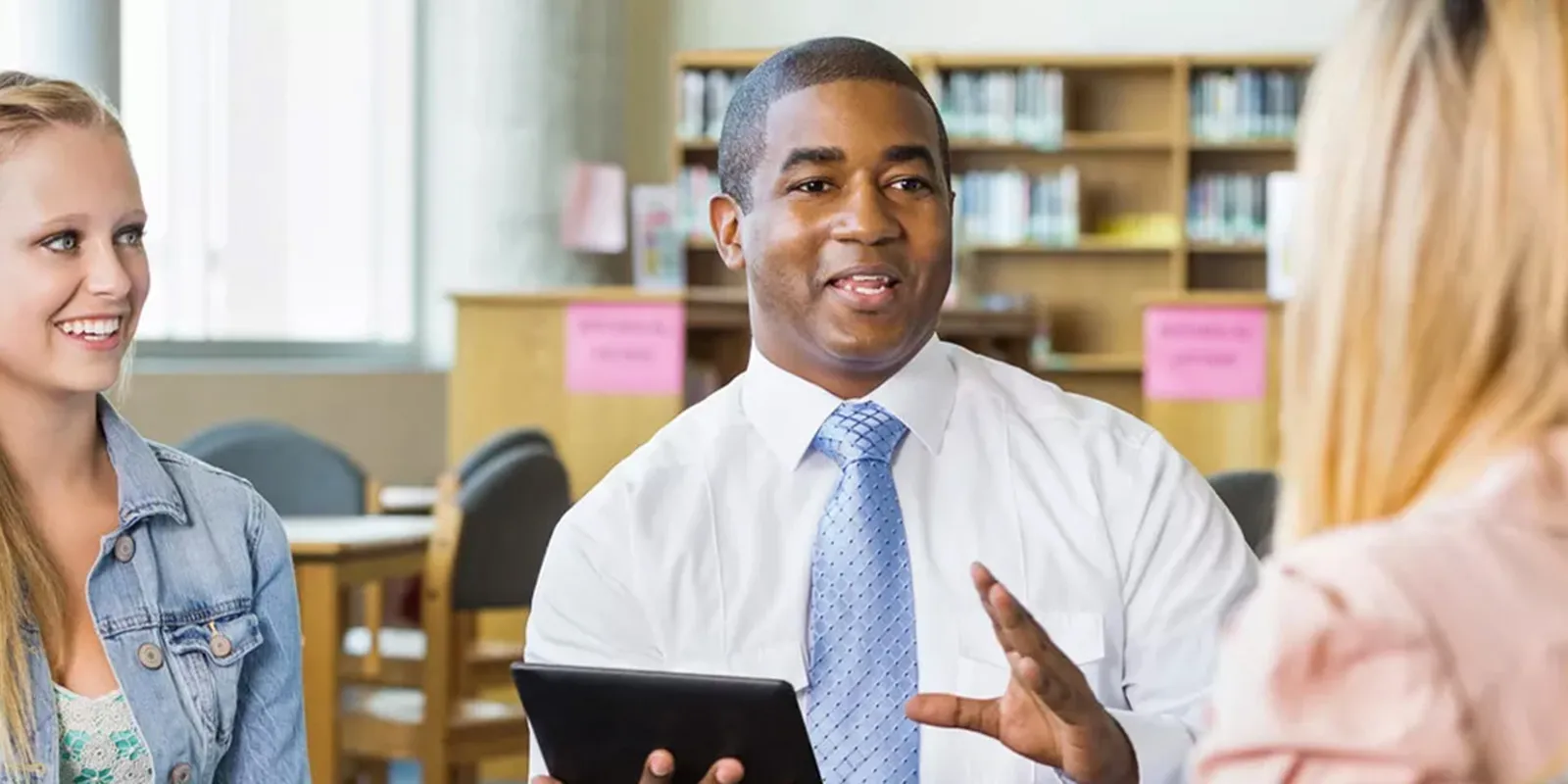 Teachers talking around a table